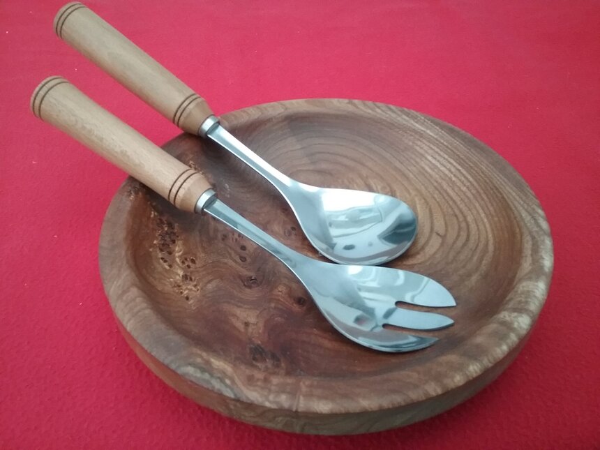 Assortment of hand-turned wooden bowls on a table