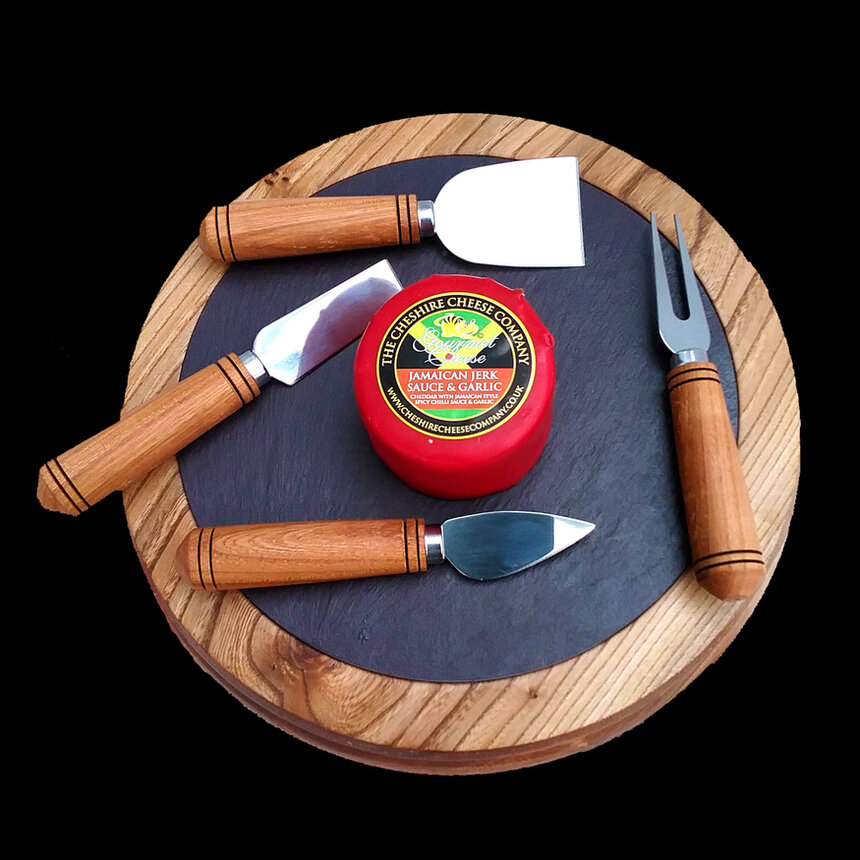 Wooden cheese and deli boards laid with food
