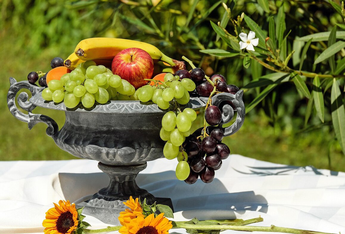 Shallow elm fruit bowl with fruit inside
